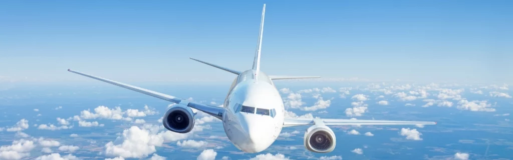 Plane flying above the clouds